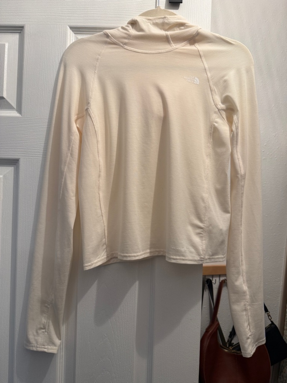 The North Face Women's Long-Sleeve Hooded Top in Soft Cream